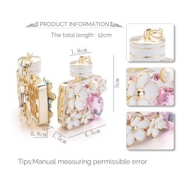 Perfume bottle with crystals and flowers - keychainKeyrings