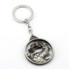 Round metal keychain with dragonKeyrings