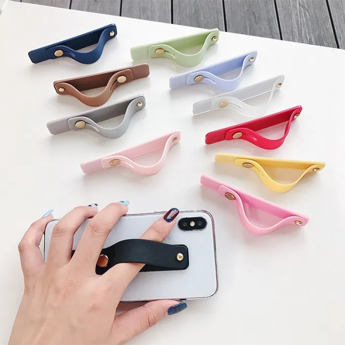 Universal phone holder - silicone wristband - finger ring grip - stickerHolders