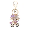 Crystal kitten on a bicycle - keychainKeyrings