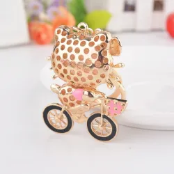 Crystal kitten on a bicycle - keychainKeyrings