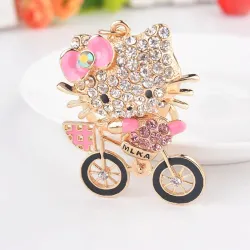 Crystal kitten on a bicycle - keychainKeyrings