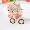 Crystal kitten on a bicycle - keychainKeyrings
