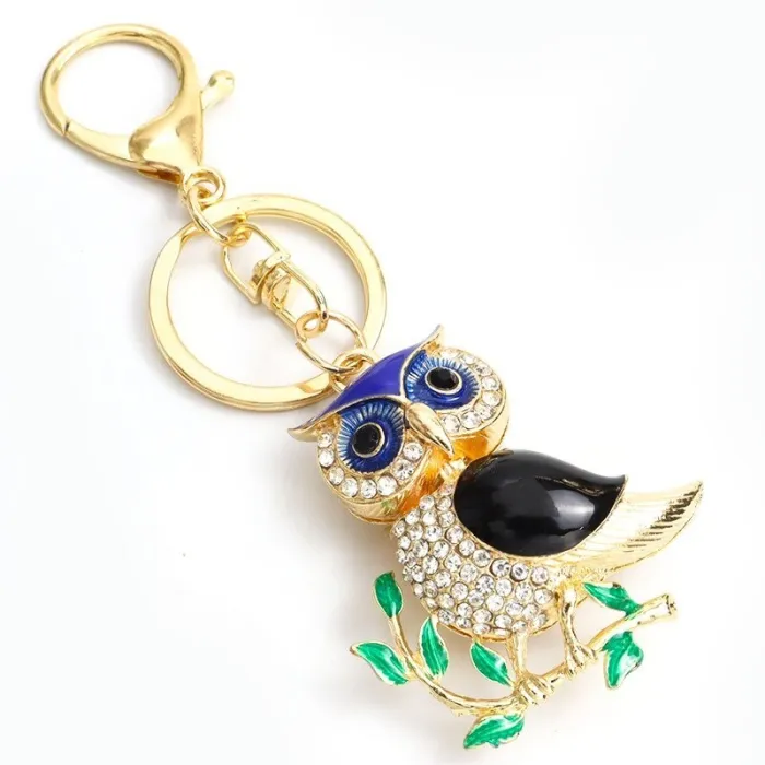 Golden crystal owl - green leaves - keychainKeyrings