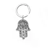 Chakra Hamsa hand / natural hexagonal stone - keychainKeyrings