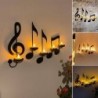 Wall mounted candle holder - black music notesCandles & Holders