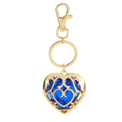 Crystal heart in golden cage - keychainKeyrings