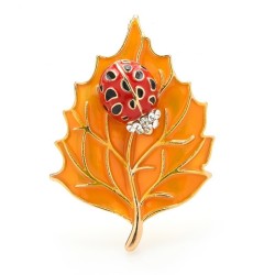 Brooch with beetle and leafBrooches