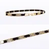 Elegant black elastic belt - with golden metal decorationsBelts