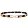 Elegant black elastic belt - with golden metal decorationsBelts