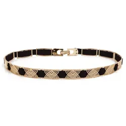 Elegant black elastic belt - with golden metal decorationsBelts