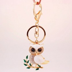 Sitting on the branch white crystal owl - keychainKeyrings