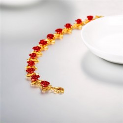 Gold & silver bracelet with red rosesBracelets