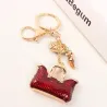 Two crystal red bags & high-heeled shoe - keychainKeyrings